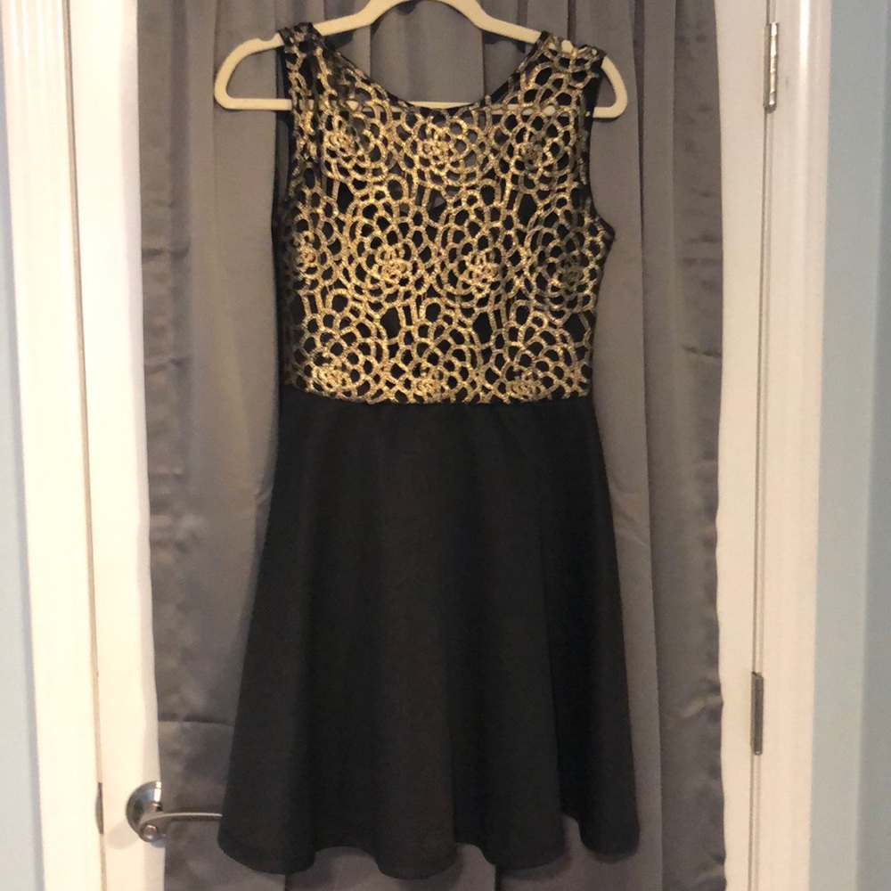 Black and gold skater dress